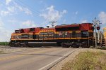 A look at the dedication on KCS 4009's long hood as it crosses County H